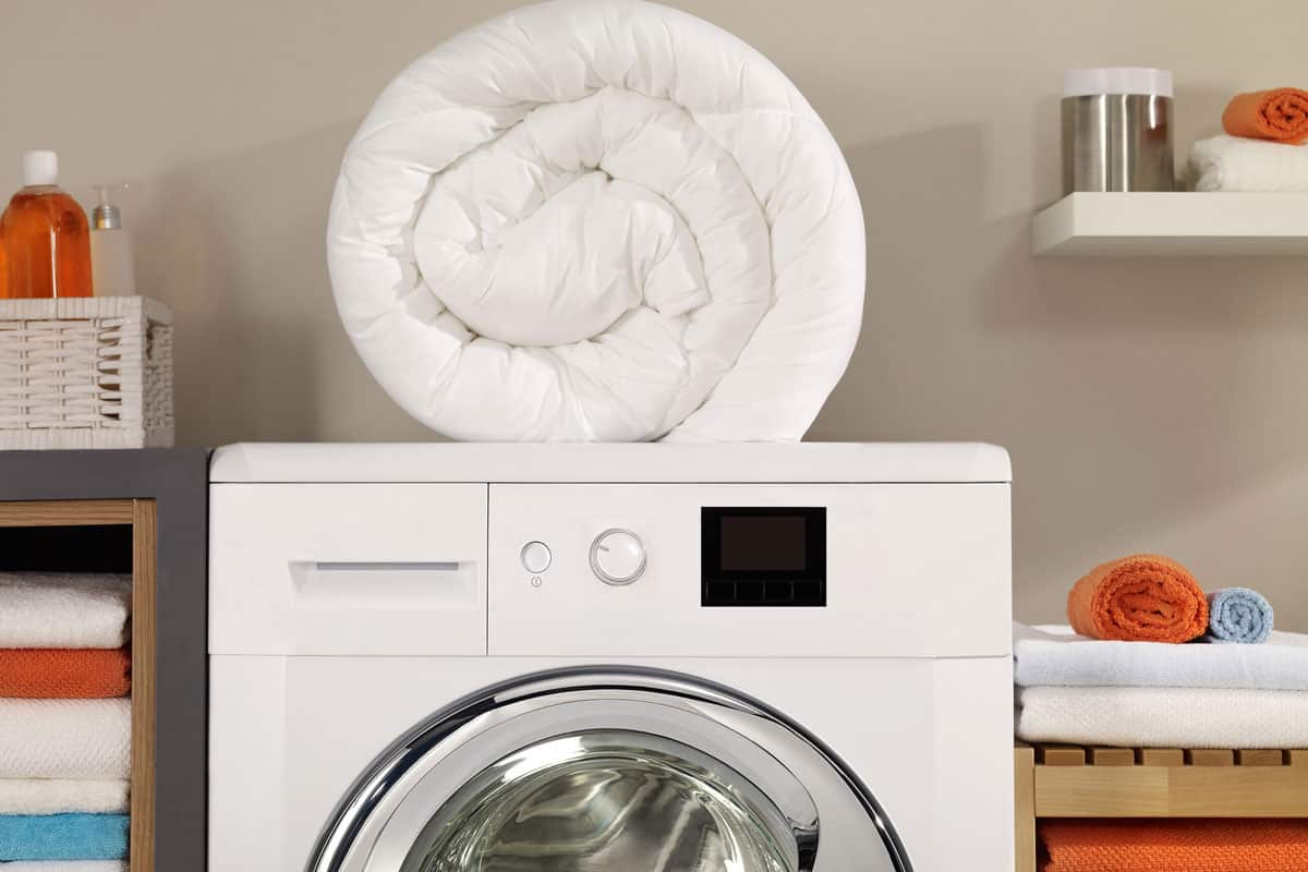 täcke ovanpå tvättmaskinen.